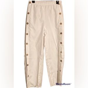 NWOT White pants with accent buttons down the sides